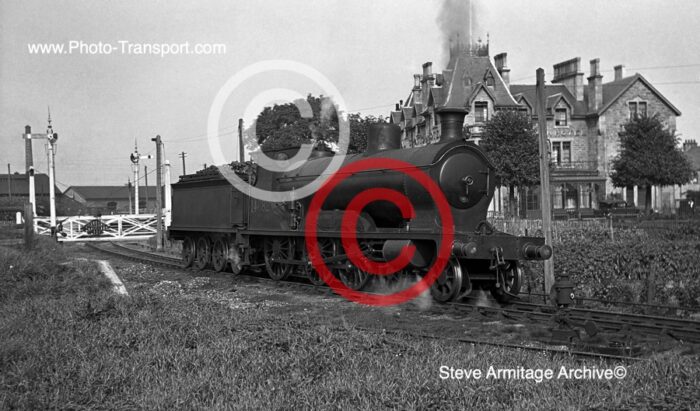 Ex Highland Railway"Castle"Class 4-6-0 No.14682 "Beaufort Castle" at Forres,Tytler Street crossing.