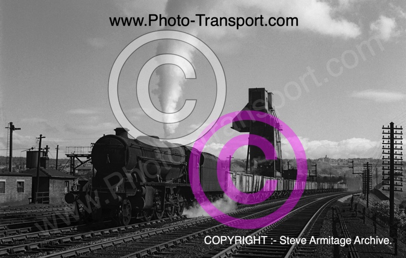 LMS "8F" Class 2-8-0 No.48512 seen passing Hillhouse MPD,Huddersfield.