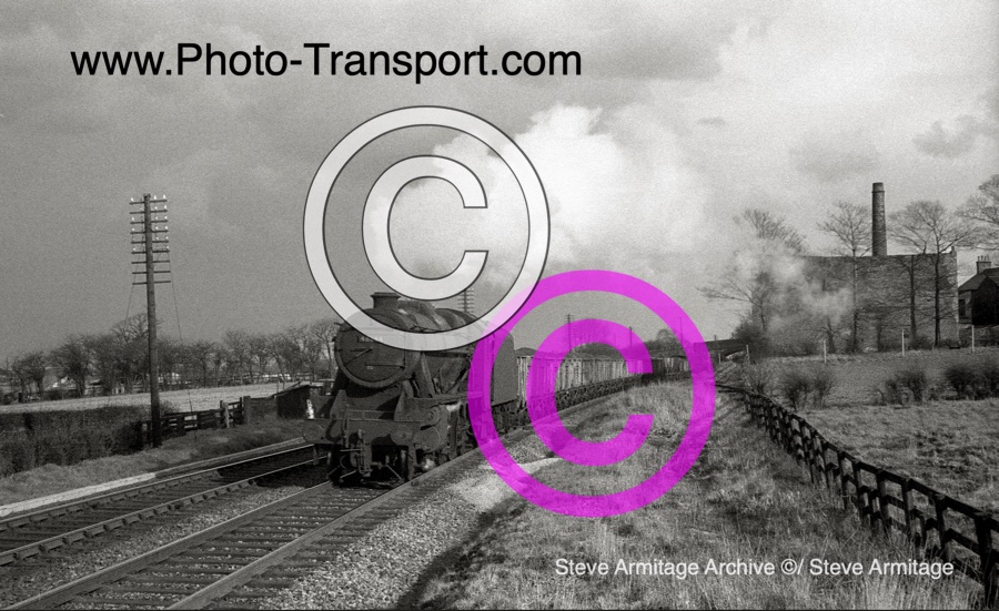 Ex-LMS "8F" Class 2-8-0 No.48664 unidentified location possibly Garforth area? on Thursday 24.3.1966.