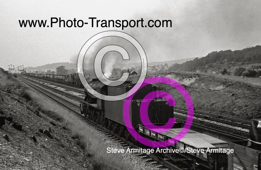 "WD"Class 2-8-0 No.90680 and Ex-LMS "8F" Class 2-8-0 No.48602 at Heaton Lodge Jctn,Mirfield on Wednesday 17th August 1966.