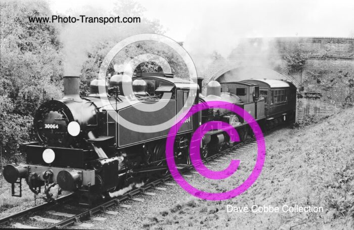 USA Tank 0-6-0T No.30064 double heads with LSWR Adams Radial Tank 4-4-2T No.488 Nr.Suffolk Park on the 14.40pm ex Sheffield Park -1976 (Bluebell Railway)