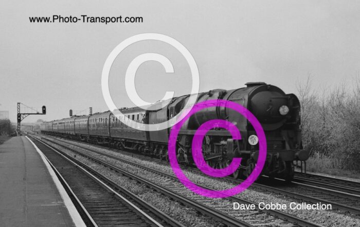 Merchant Navy Rebuilt 4-6-2 No.35008 Orient Line comes through Raynes Park Station on 07.43am Weymouth - Waterloo express - 1960’s 
